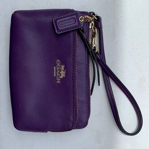 Coach wristlet- purple with gold detail